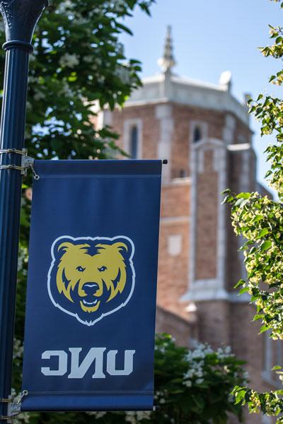 UNC Flag outside of Gunter Hall